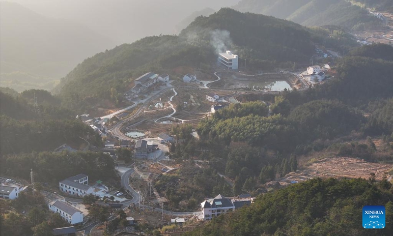 This aerial photo taken on Jan. 6, 2024 shows homestays in Shuihou Township of Qianshan City, east China's Anhui Province. The tourist service of Shuihou Township at the foot of Tianzhu Mountain used to be limited to pure sightseeing in the mountainous areas. In recent years, the service has been diversified with the development of a number of high-quality homestays. (Xinhua/Du Yu)