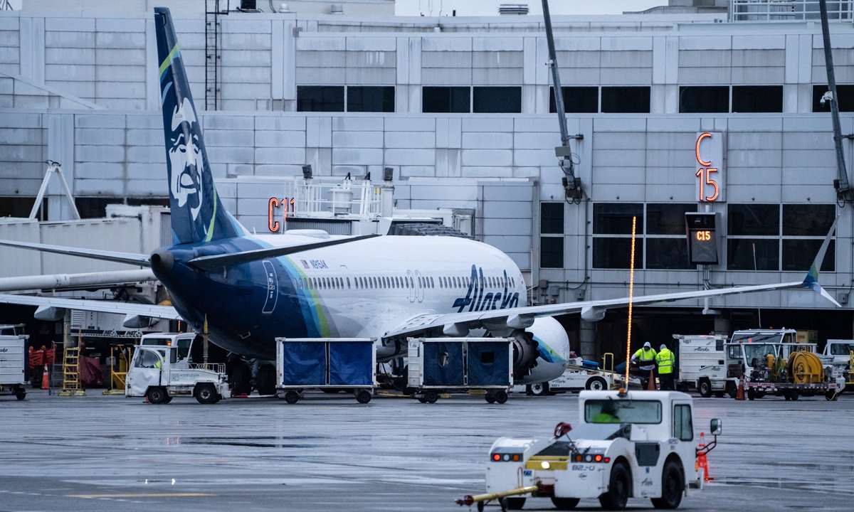 

An Alaska Airlines Boeing 737 MAX 9 plane sits at a gate at Seattle-Tacoma International Airport on January 6, 2024 in Seattle, Washington. Alaska Airlines grounded its 737 MAX 9 planes after part of a fuselage blew off during a flight from Portland Oregon to Ontario, California. Photo: AFP