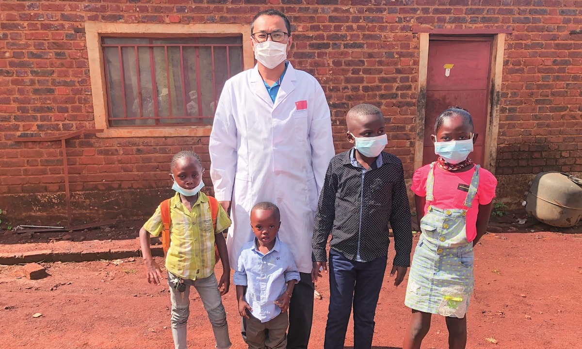 Yuan Shuai with local children in Democratic Republic of the Congo Photo: Courtesy of Yuan