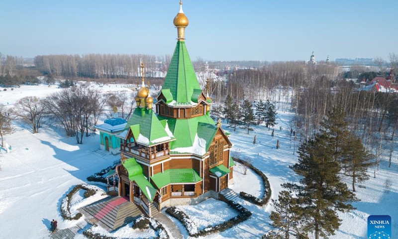 This aerial photo taken on Jan. 7, 2024 shows people visiting the Volga Manor in Harbin, northeast China's Heilongjiang Province. The Volga Manor, a Russian culture-themed park, turned into a world of ice and snow during the winter time, attracting lots of visitors.(Photo: Xinhua)
