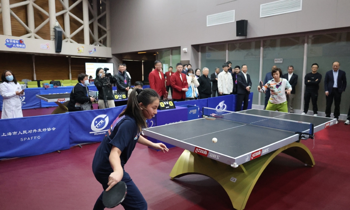 A US student plays table tennis with retired Chinese table tennis star Zhang Yining in Shanghai on January 9, 2024. Photo: Courtesy of the International Table Tennis Federation Museum and China Table Tennis Museum