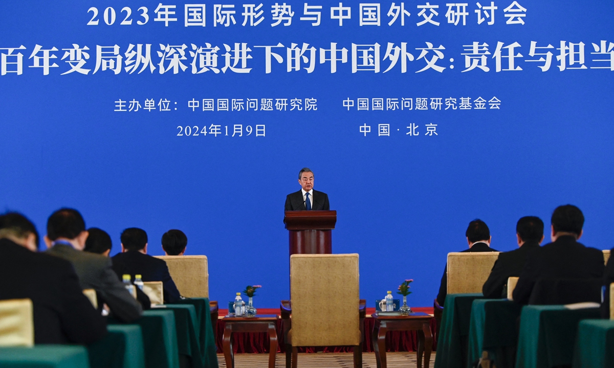 Chinese Foreign Minister Wang Yi, also a member of the Political Bureau of the Communist Party of China Central Committee, addresses a symposium on the international situation and China's diplomacy in 2023 in Beijing on January 9, 2024. Photo: AFP