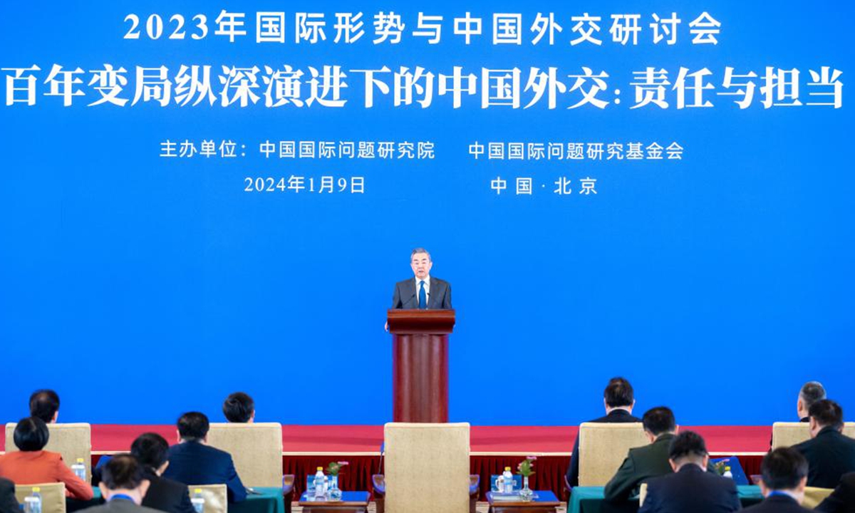 Chinese Foreign Minister Wang Yi, also a member of the Political Bureau of the Communist Party of China Central Committee, addresses the symposium on the international situation and China's foreign relations in 2023 in Beijing, capital of China, Jan. 9, 2024. (Xinhua/Zhai Jianlan)