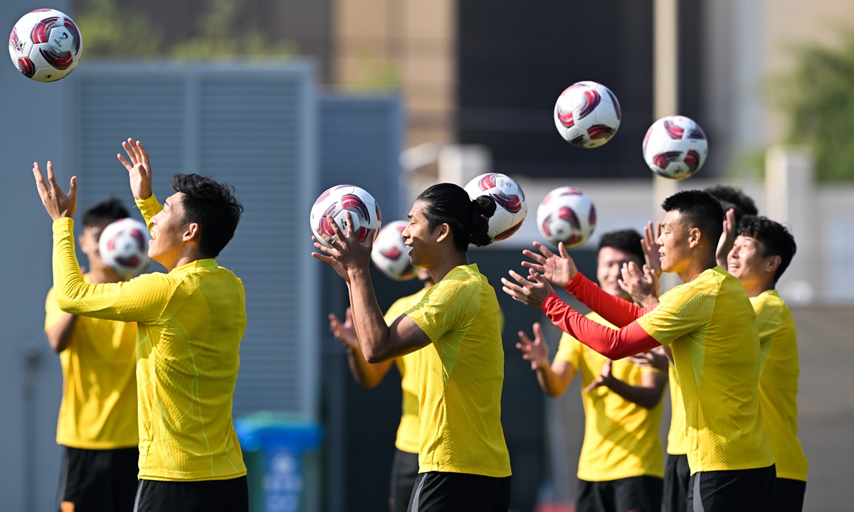 Chinese national football team players have fun in a training session in Doha, Qatar, on January 11, 2024. Team China will face Tajikistan in their first group match at the 2024 Asian Cup on January 13.  The other two teams in Group A are Lebanon and Qatar.
Photo: VCG