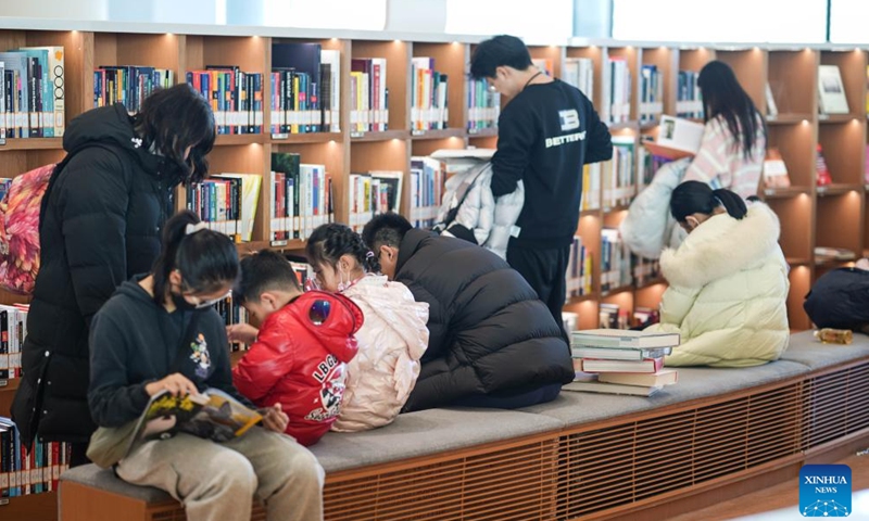 Citizens read at Beijing Library in Beijing, capital of China, Jan. 14, 2024.Many citizens visited the recently opened library to spend their leisure time this weekend. (Xinhua/Peng Ziyang)