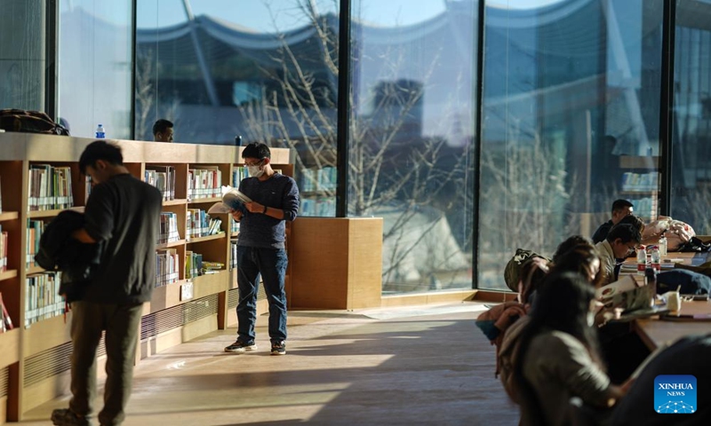 Citizens read at Beijing Library in Beijing, capital of China, Jan. 14, 2024. Many citizens visited the recently opened library to spend their leisure time this weekend. (Xinhua/Peng Ziyang)