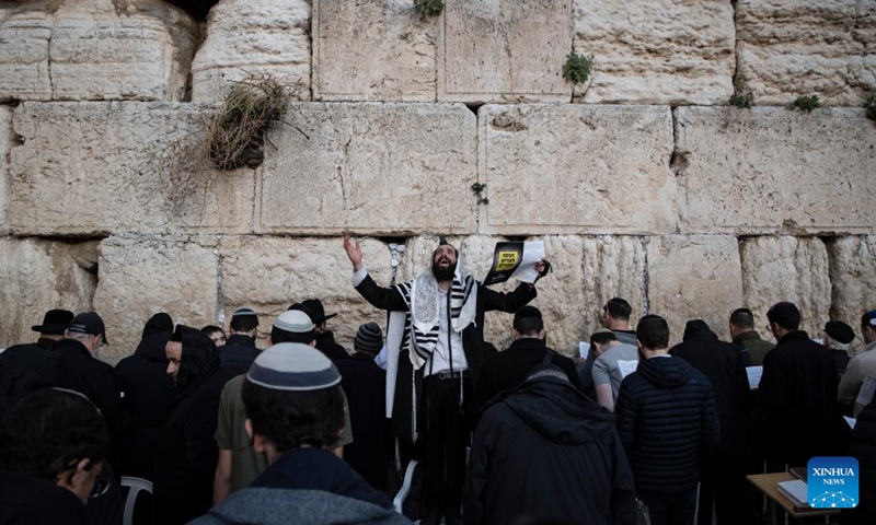 People attend a mass public prayer to demand the release of Israeli hostages held in Gaza at the Western Wall in Jerusalem, on Jan. 10, 2024.(Photo: Xinhua)