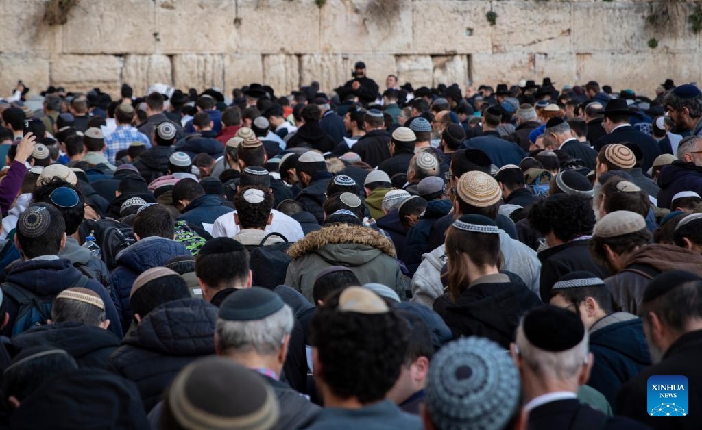 People attend a mass public prayer to demand the release of Israeli hostages held in Gaza at the Western Wall in Jerusalem, on Jan. 10, 2024.(Photo: Xinhua)