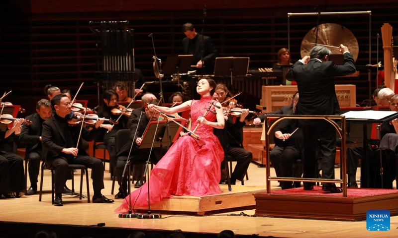Chinese Huqin (a traditional Chinese string instrument) artist Lu Yiwen (C) performs during a concert presented by the Philadelphia Orchestra to celebrate Chinese New Year in Verizon Hall at the Kimmel Center for the Performing Arts in Philadelphia, the United States, Jan. 12, 2024.