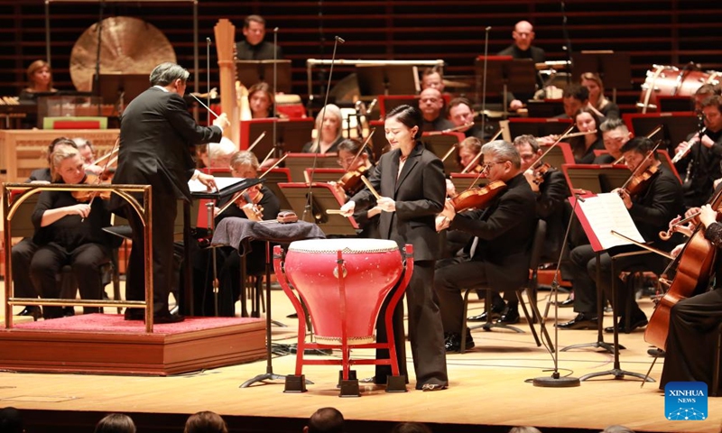 Fu Yifei (C), a percussionist from the Shanghai Symphony Orchestra, performs during a concert presented by the Philadelphia Orchestra to celebrate Chinese New Year in Verizon Hall at the Kimmel Center for the Performing Arts in Philadelphia, the United States, Jan. 12, 2024.