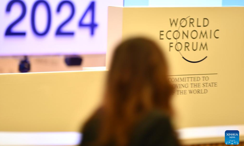 A woman is seen at the Congress Center for the World Economic Forum (WEF) Annual Meeting 2024 in Davos, Switzerland, Jan. 14, 2024. On the theme of Rebuilding Trust, the 54th WEF Annual Meeting will take place here from Jan. 15 to Jan. 19. The main topics at the forum range from achieving security and cooperation in a divided world, creating jobs and growth for a new era to a long-term strategy for climate, nature and energy. (Xinhua/Lian Yi)