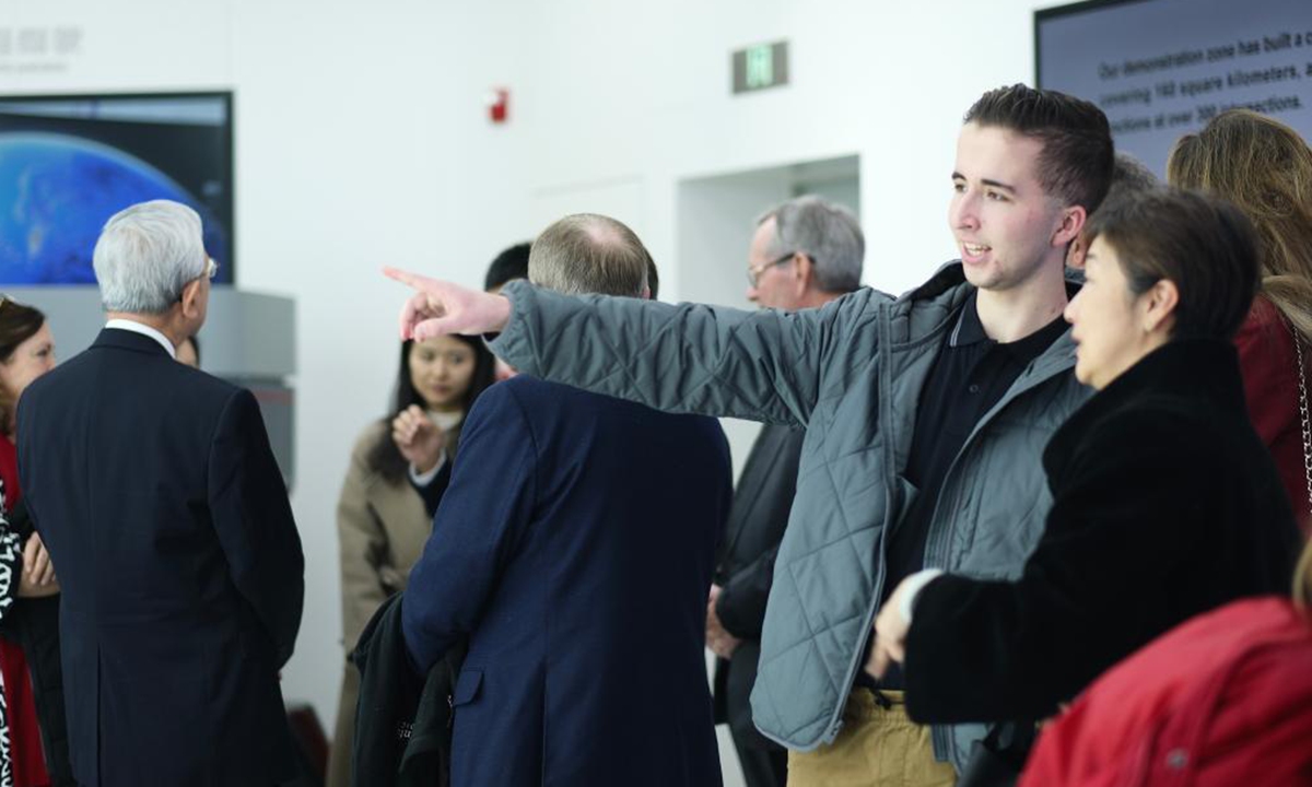 Peyton Shields, a U.S. high-school student visits Beijing High-level Autonomous Driving Demonstration Zone in Beijing on Jan. 8, 2024.(Photo: Xinhua)