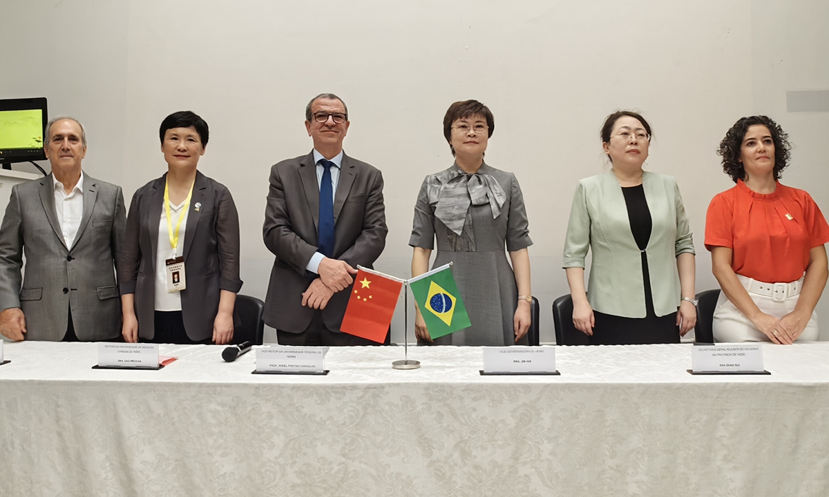 Gao Weijuan (second from left) attends the ceremony to unveil a TCM diagnosis and treatment center at the TCM Confucius Institute, FUG, on October 30, 2023. Photo: Courtesy of HEBCM