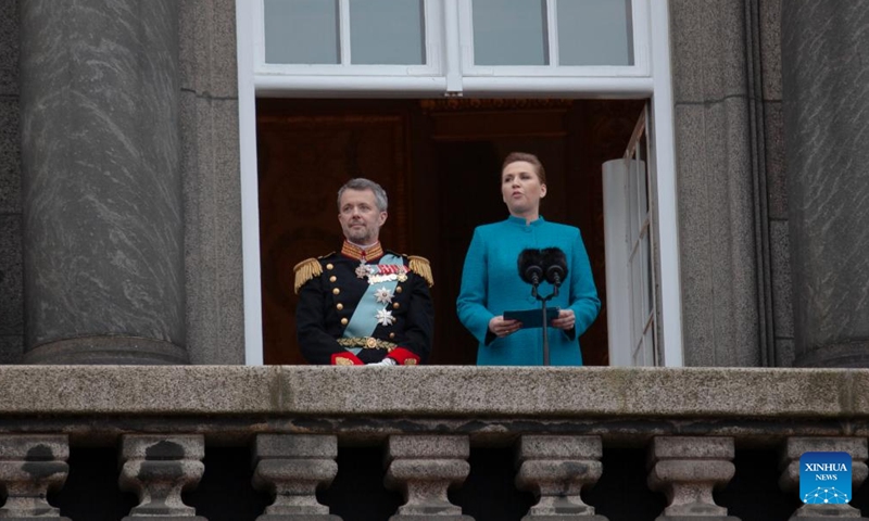 Denmark's Prime Minister Mette Frederiksen (R) proclaims the accession of the throne from Queen Margrethe to King Frederik X from the balcony at Christiansborg Palace Square in Copenhagen, Denmark, Jan. 14, 2024. Denmark's Crown Prince Frederik was formally proclaimed king by the country's prime minister Mette Frederiksen on Sunday. (Xinhua/Lin Jing)
