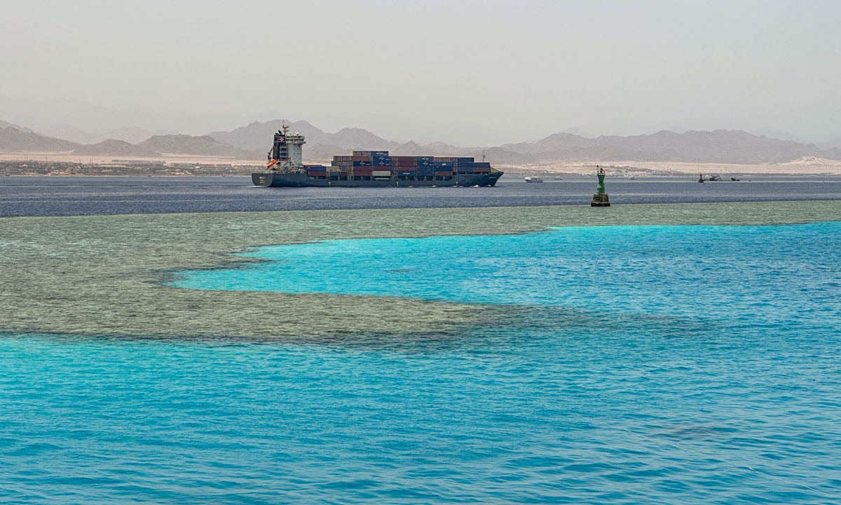 A container ship sails in the Red Sea in the Straits of Tiran, in 2023. Photo: IC