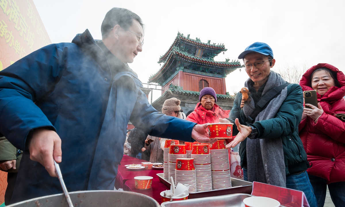 As the Spring Festival draws near, local residents in Beijing celebrate the Laba Festival on January 18, 2024. The Laba Festival falls on the eighth day of the 12th month on the Chinese calendar, heralding the start of the Lunar New Year. Residents enjoyed steaming hot Laba porridge as part of the tradition to celebrate the day, which is believed to bring good luck to people in the coming year. Photo: Chen Tao/GT