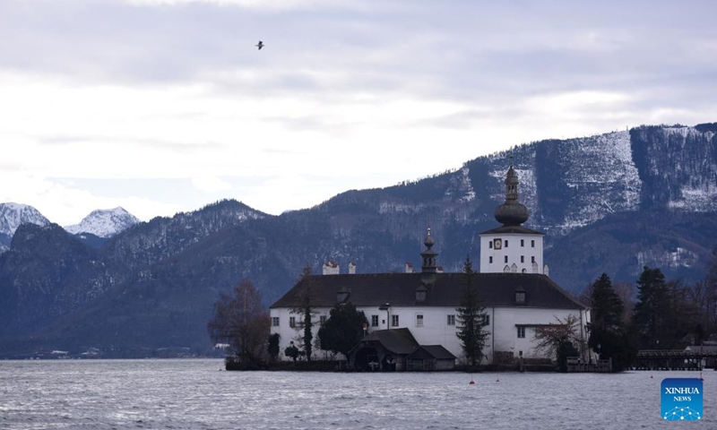 This photo taken on Jan. 18, 2024 shows Schloss Ort and Lake Traunsee at Gmunden in Austria. Bad Ischl Salzkammergut has been awarded as the 2024 European Capital of Culture. (Xinhua/He Canling)