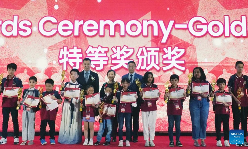 This photo taken on Jan. 20, 2024 shows the awards ceremony of the Third Indonesia Shenmo Cup International Abacus Mental Arithmetic Competition in Bandung, West Java, Indonesia. The event kicked off on Saturday with nearly 200 children competing in this year's competition. (Xinhua/Ma Ning)