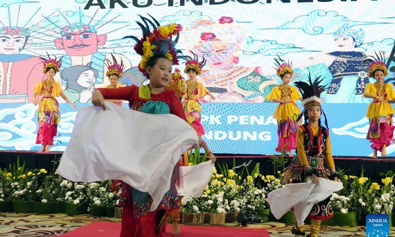 Children perform during the Third Indonesia Shenmo Cup International Abacus Mental Arithmetic Competition in Bandung, West Java, Indonesia, Jan. 20, 2024. The event kicked off on Saturday with nearly 200 children competing in this year's competition. (Xinhua/Ma Ning)