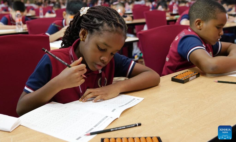 Contestants compete in the Third Indonesia Shenmo Cup International Abacus Mental Arithmetic Competition in Bandung, West Java, Indonesia, Jan. 20, 2024. The event kicked off on Saturday with nearly 200 children competing in this year's competition. (Xinhua/Ma Ning)