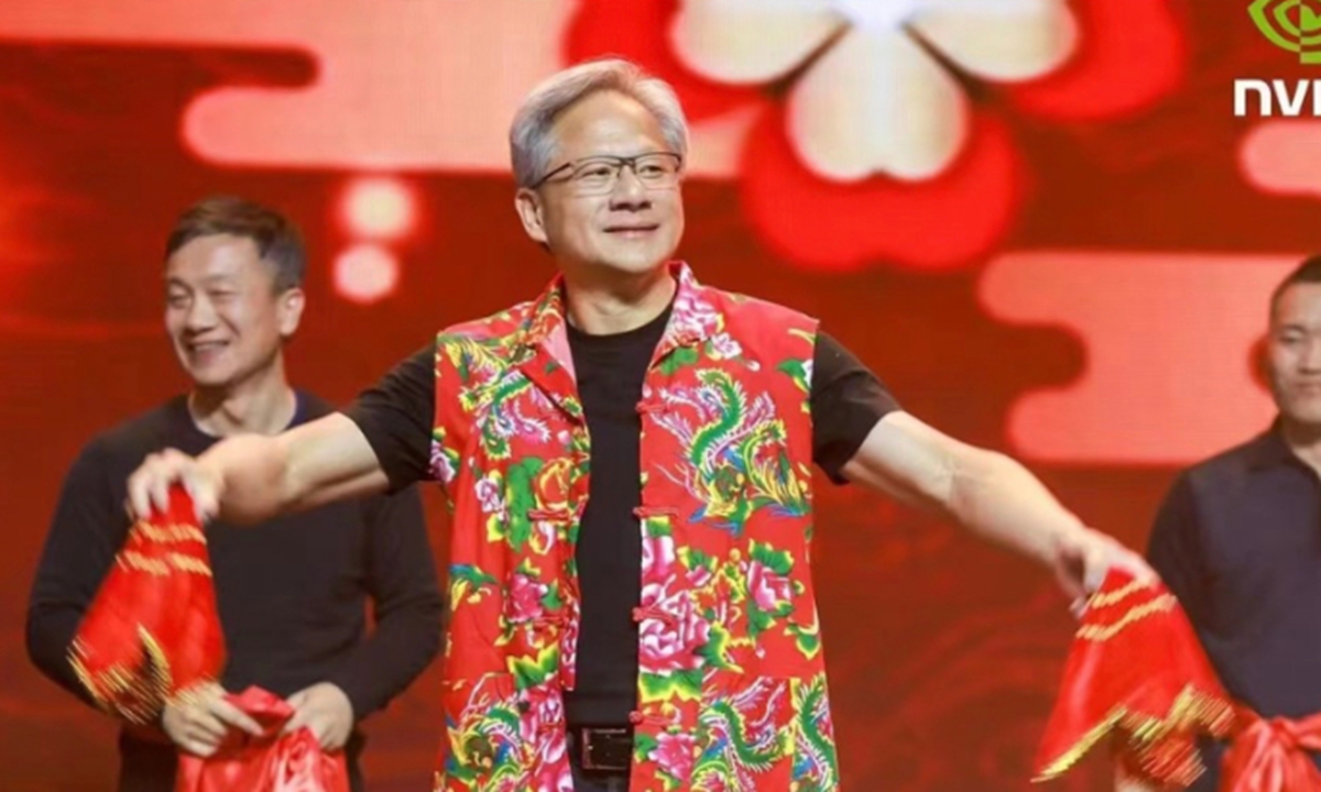 Jensen Huang, president and CEO of Nvidia, dances in a Harbin-style cotton coat at a gala in Shanghai. Photo: yicai.com