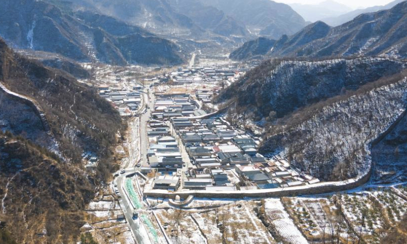 An aerial drone photo taken on Feb. 25, 2024 shows a general view of Changyucheng Village with its two parts built in 1520 (in the foreground) and in 1573 (in the background), respectively, in Changping District, Beijing, capital of China. Built in the Ming Dynasty (1368-1644), Changyucheng is an ancient Chinese village rich in historical and cultural resources. (Xinhua/Chen Zhonghao)