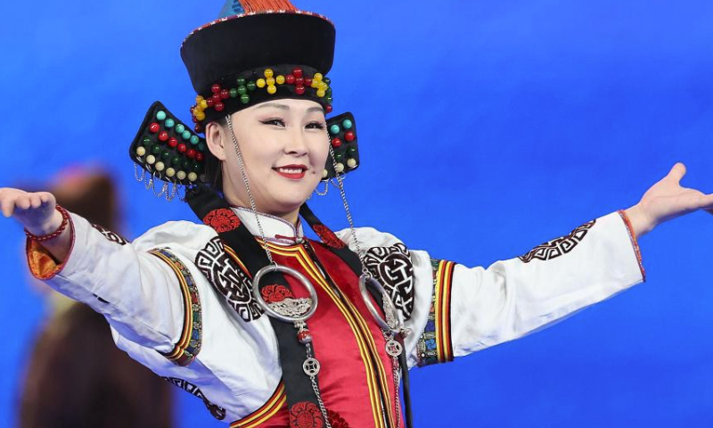 An artist performs before the opening ceremony of the China's 14th National Winter Games in Hulun Buir, north China's Inner Mongolia Autonomous Region, Feb. 17, 2024. (Xinhua/Li Bo)