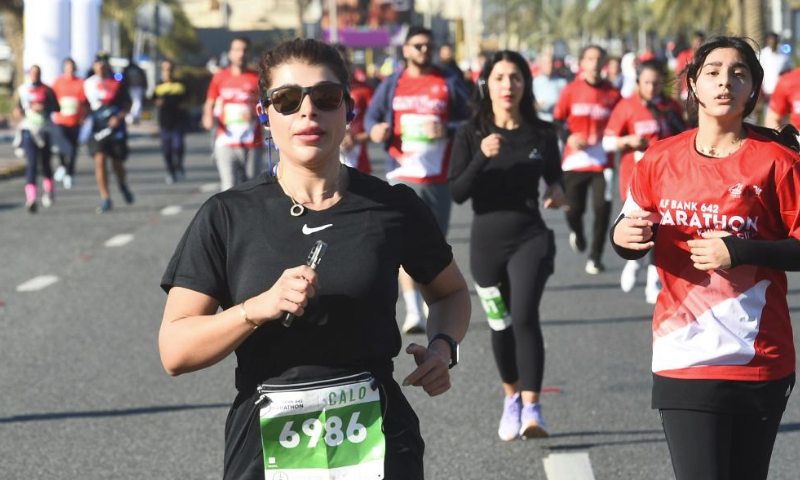 Runners participate in the Kuwait Marathon in Kuwait City, Kuwait, March 2, 2024. (Photo by Asad/Xinhua)