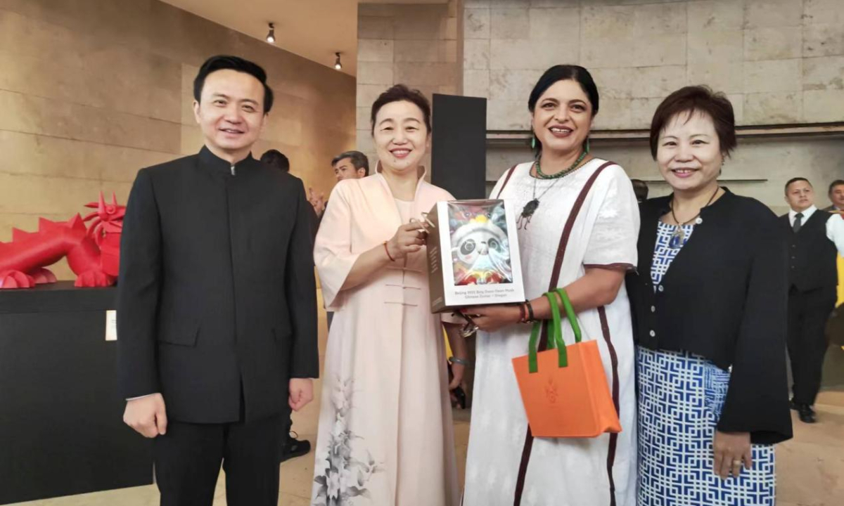 Pang Wei (second left), an official from the Beijing Municipal Culture and Tourism Bureau, takes a photo with Zhang Run (first left), Chinese Ambassador to Mexico, and Mexican Minister of Culture Alejandra Frausto Guerrero (third left). Photo: Courtesy of Beijing Overseas Cultural Exchange Center