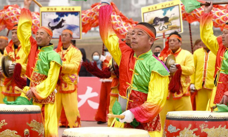 Drum dancers perform in Huyi District, Xi'an of northwest China's Shaanxi Province, Feb. 18, 2024. (Xinhua/Liu Xiao)