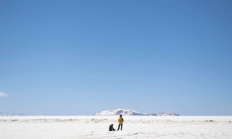 Tourists rest on the frozen Lake Namtso in southwest China's Xizang Autonomous Region, Feb. 8, 2024.

Iconic tourist destinations in Xizang, such as Potala Palace, have been open to the public free of charge until March 15 of 2024, as part of the region's winter tourism promotion.

During the winter promotion period, all scenic spots rated above A level in Xizang are open to the public free of charge, except for temple sites. (Xinhua/Sun Ruibo)


