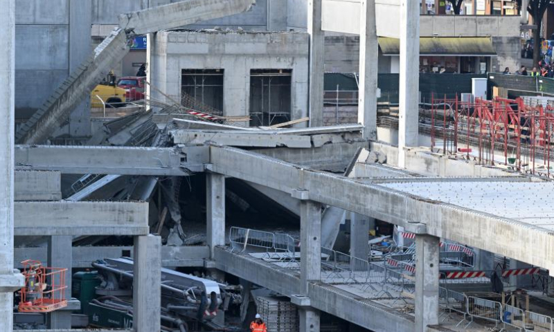 Rescuers work at the site where the slab of a prefabricated building in a mall complex under construction collapsed in northwest Florence, Tuscany region, Italy, on Feb. 16, 2024. At least two workers died and three others were injured after the slab of the building collapsed here on Friday, local authorities said. (Xinhua)