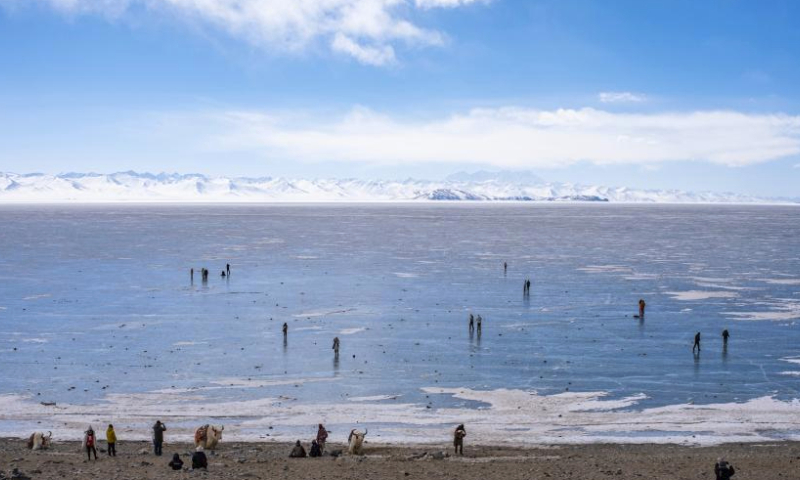 Tourists have fun on the frozen Lake Namtso in southwest China's Xizang Autonomous Region, Feb. 8, 2024.

Iconic tourist destinations in Xizang, such as Potala Palace, have been open to the public free of charge until March 15 of 2024, as part of the region's winter tourism promotion.

During the winter promotion period, all scenic spots rated above A level in Xizang are open to the public free of charge, except for temple sites. (Xinhua/Sun Fei)