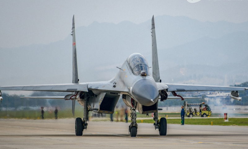 Fighter jet attached to an aviation brigade of the air force taxis on the flightline before takeoff for a flight training exercise on February 20, 2024. (eng.chinamil.com.cn/Photo by Fu Gan)