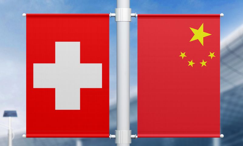 National flags of China and Switzerland Photo: VCG