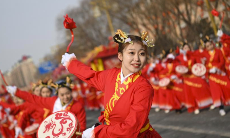 People perform Yangge, a traditional folk dance, at Guangling County of Datong, north China's Shanxi Province, Feb. 24, 2024. People across the country celebrated the Lantern Festival on Saturday amid a festive and bustling atmosphere. (Photo by Huo Feifei/Xinhua)