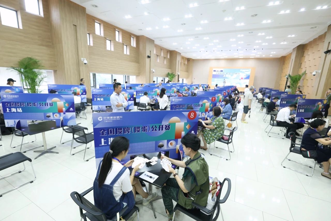 Participants play guandan card game at the national open competition in Shanghai. Photo: Shanghai sports bureau
