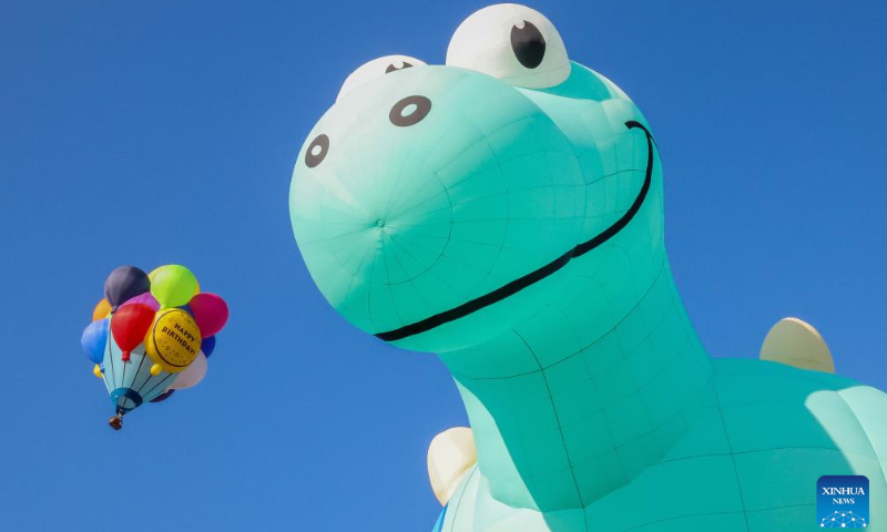 Hot air balloons rise during the 24th Philippine International Hot Air Balloon Fiesta in Tarlac Province, the Philippines, on Feb. 16, 2024. The 24th Philippine International Hot Air Balloon Fiesta will be held here from Feb. 16 to 18 to showcase hot air balloons and hold many aerial activities. (Xinhua/Rouelle Umali)