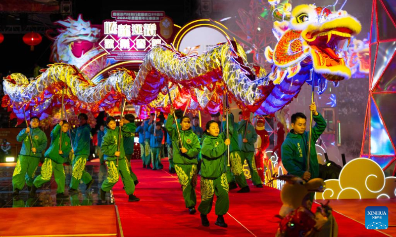 Actors perform during Celebrations of the 25th Anniversary of the Establishment of the Macao Special Administrative Region and the Parade for Celebration of the Year of the Dragon in south China's Macao on Feb. 12, 2024. (Xinhua/Cheong Kam Ka)