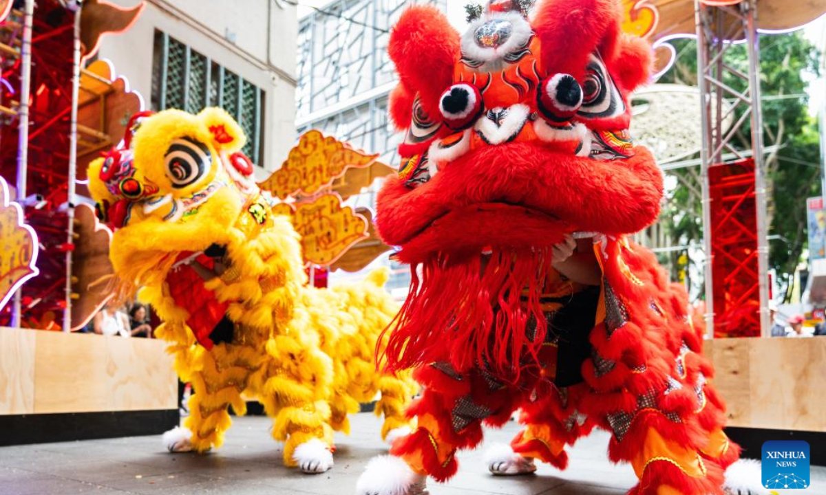 A lion dance team performs during a media launch for the Sydney Lunar Festival event at the Chinatown in Sydney, Australia, Feb 8, 2024. A launching ceremony was held on Thursday in the city center of Australia's Sydney for a 16-day festival to ring in the Year of the Dragon. Photo:Xinhua