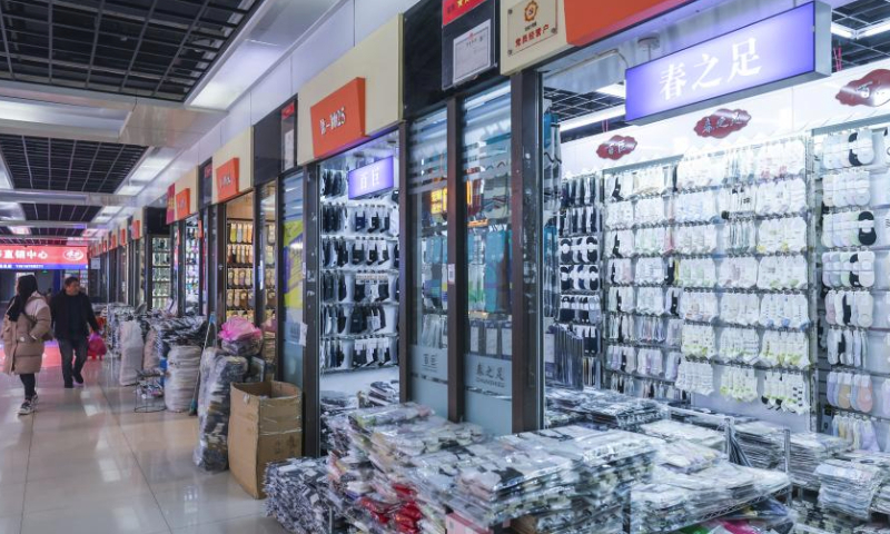 This photo taken on Feb. 24, 2024 shows sock shops at the Datang subdistrict in Zhuji, east China's Zhejiang Province.

Production lines of sock companies in east China's Zhuji City, dubbed as the sock capital, are operating at full swing to meet the orders.

As the world's largest sock manufacturing base, the Datang sub-district of Zhuji in Zhejiang Province produces approximately 25 billion pairs of socks yearly, accounting for more than 70 percent of the output of China and one-third of the whole world. (Xinhua/Xu Yu)