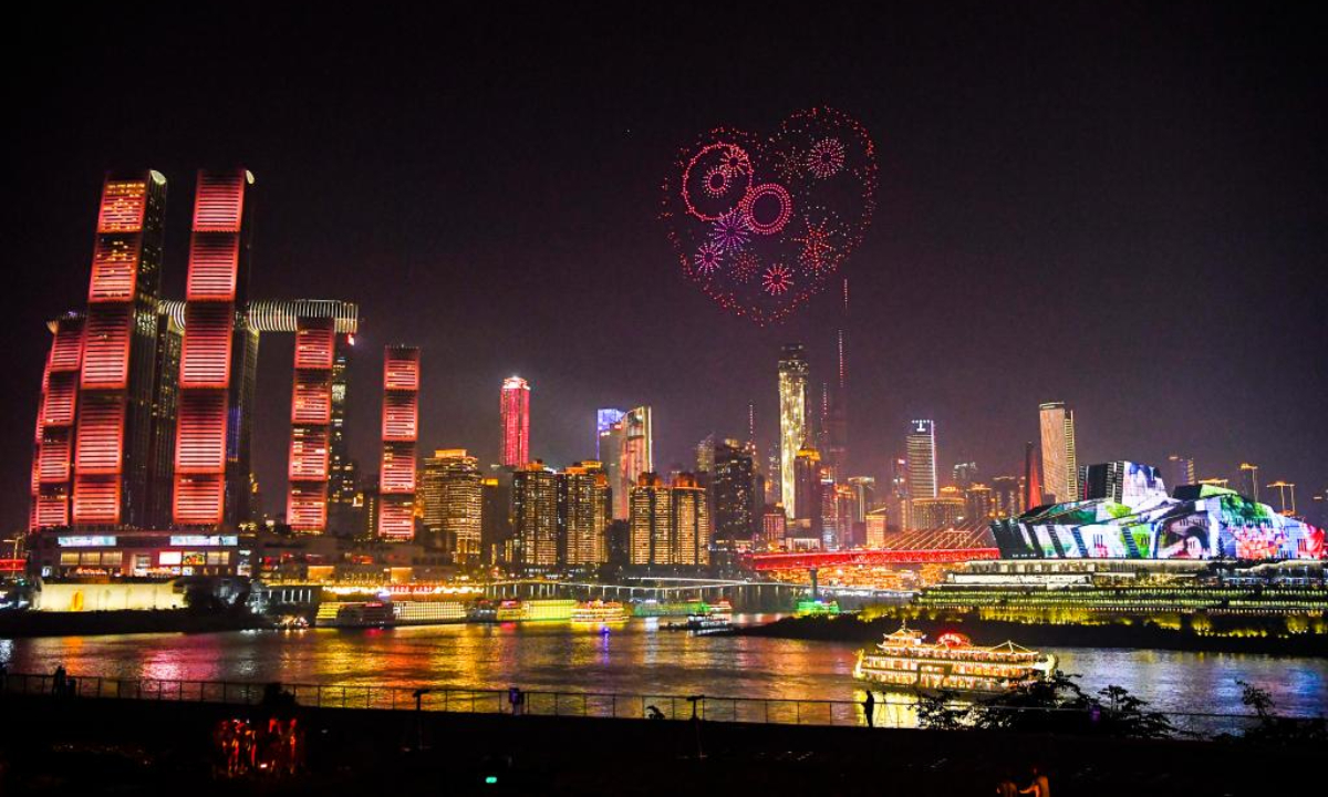 This photo taken on Feb 9, 2024 shows a light show on the eve of Chinese Lunar New Year in southwest China's Chongqing Municipality. Photo:Xinhua