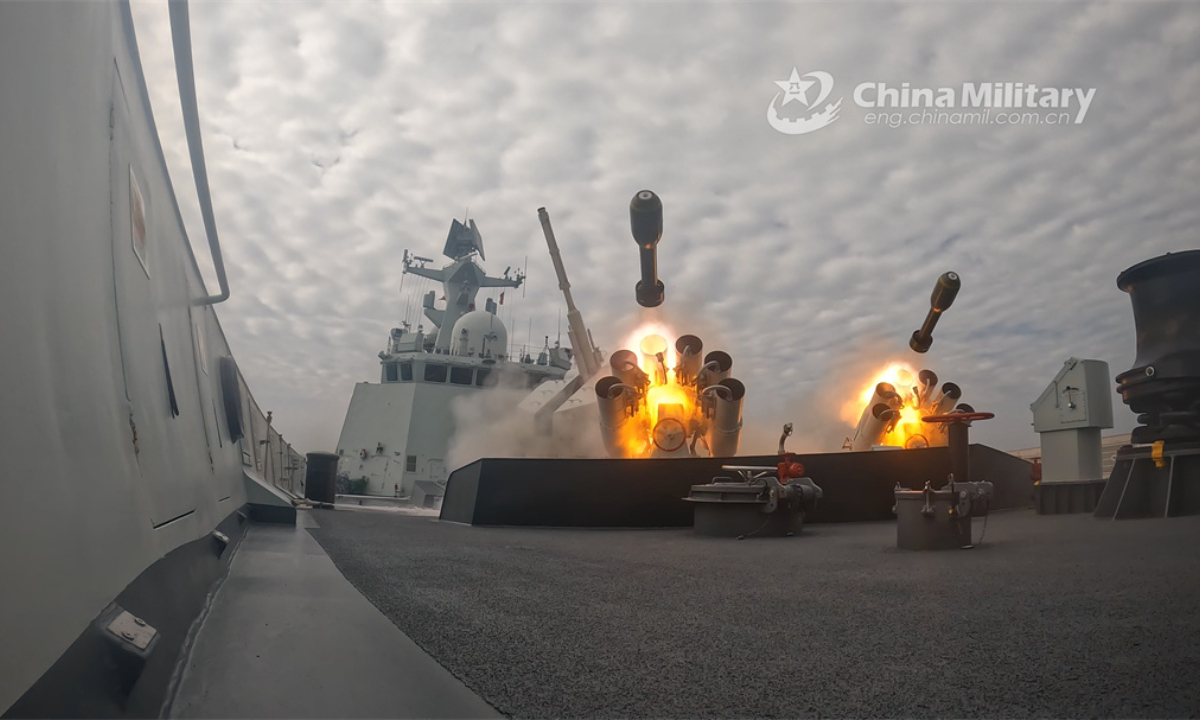 A guided-missile frigate attached to a frigate flotilla of the PLA Navy fires rocket-propelled depth charges at mock target during a live-fire training exercise in early January, 2024. Photo:China Military