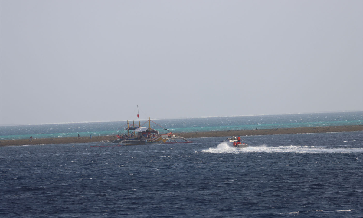 A law enforcement boat released by China Coast Guard ship 3104 gives verbal warnings and dispel the Philippine personnel from the reefs of China’s Huangyan Dao on January 12, 2024. (File photo)