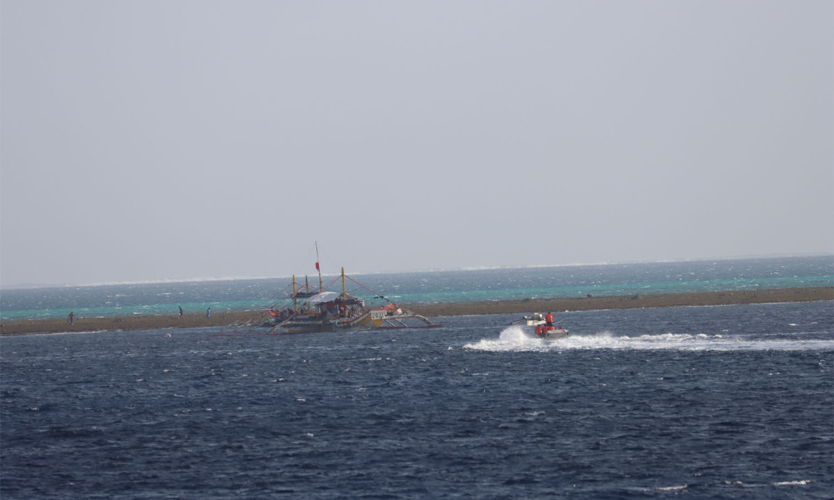 A law enforcement boat released by China Coast Guard ship 3104 gives verbal warnings and dispel the Philippine personnel from the reefs of China's Huangyan Dao on January 12, 2024. (File photo)