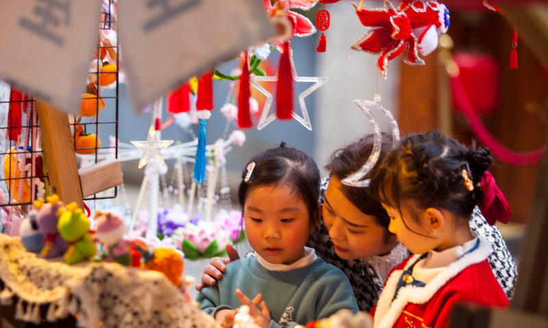 Tourists shop for lanterns and festival decorations at the Daqiao Lantern Market in Nanjing, East China’s Jiangsu Province, on February 18, 2024, for the approaching Lantern Festival, which falls on February 24. The Lantern Festival is a holiday that marks the end of Spring Festival and is celebrated with colorful lanterns and tangyuan – circular dumplings made from glutinous rice flour. Photo: VCG
