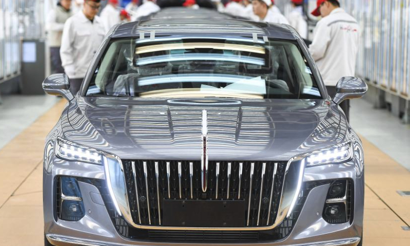 Employees check assembled cars at a workshop of automaker FAW Hongqi in Changchun, northeast China's Jilin Province, Feb. 19, 2024. Factories across China have gradually resumed operations as the country's most celebrated holiday Spring Festival ends. (Xinhua/Zhang Nan)