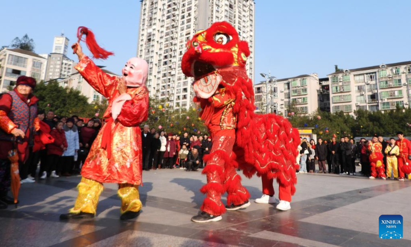 Folk artists perform lion dance in Dazhou, southwest China's Sichuan Province, Feb. 11, 2024. Chinese people celebrate the Spring Festival through various ways during their holiday. (Photo by Deng Liangkui/Xinhua)