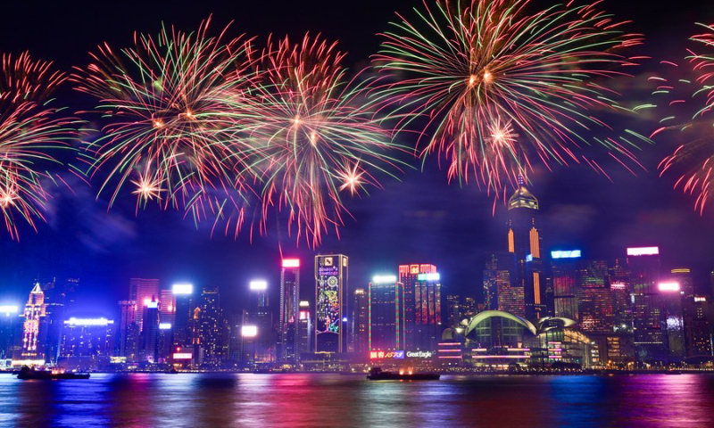 Fireworks in celebration of the Spring Festival illuminate the sky over Victoria Harbour in Hong Kong, south China, Feb. 11, 2024. (Xinhua/Zhu Wei)