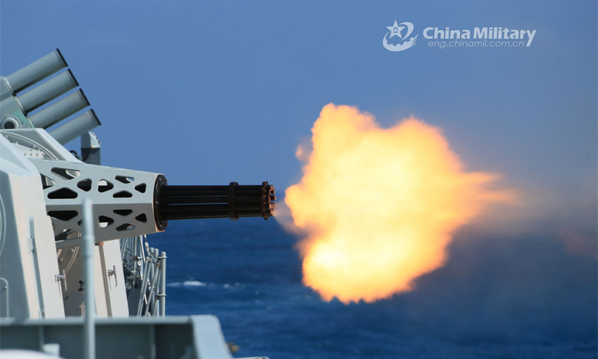 A guided-missile frigate attached to a frigate flotilla of the PLA Navy fires rocket-propelled depth charges at mock target during a live-fire training exercise in early January, 2024. Photo:China Military